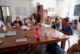 Scholars around a table